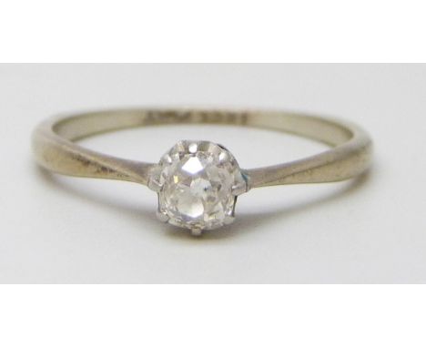 An 18ct gold and platinum set diamond solitaire ring, 1.7g, N