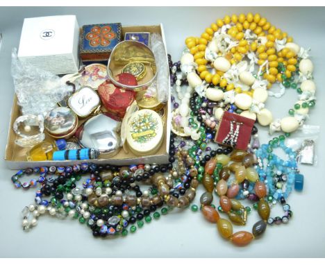 A collection of vintage beaded jewellery and a collection of pots, pill boxes, ornaments (Chanel empty) etc.