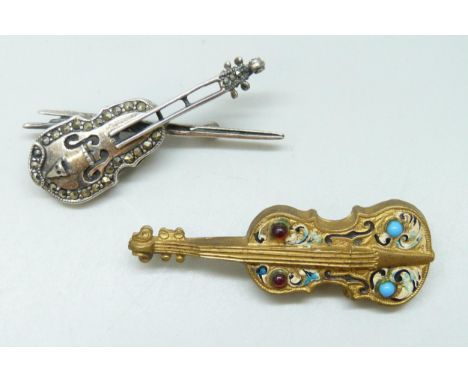 A silver brooch in the form of a violin, set with marcasite, and a gilt metal enamelled example, 5.2cm
