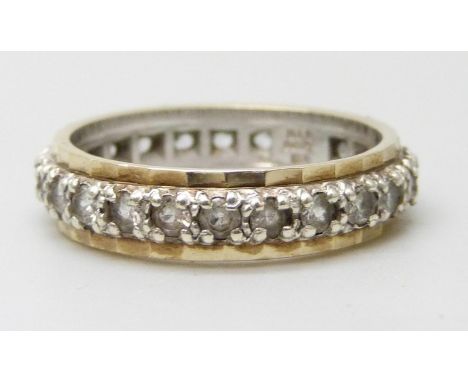 A 9ct gold eternity ring set with white spinel stones, 4.5g, R, boxed