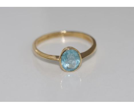 Hallmarked 9ct yellow gold and blue glass ring weight: approx 1.8 grams, size: Q-R/8