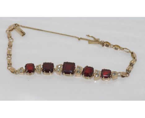 Vintage gilt metal and garnet bracelet with colourless gemstones, weight: approx 10.4 grams
