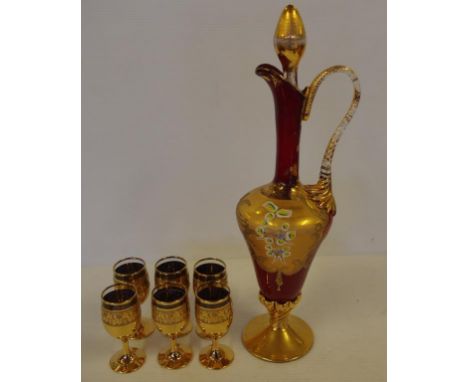 Bohemian glass decanter and six stemmed glasses with gilt and floral decoration