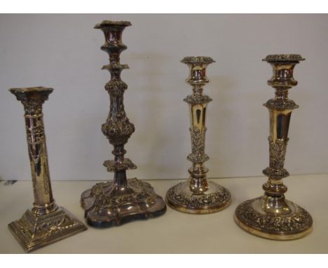 Pair of vintage silver plated candlesticks 29cm high approx., together with 2 others candlesticks