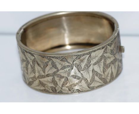 Antique engraved leaf bangle (tests as low grade silver)