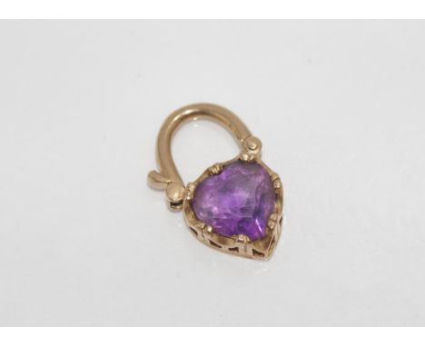 9ct yellow gold and amethyst glass locket weight: approx 2.5 grams
