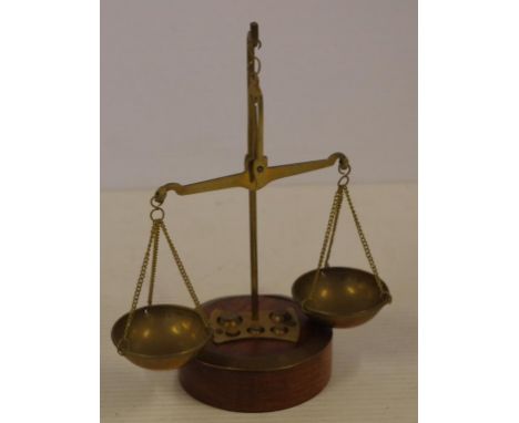 Vintage pair of miniature brass scales and weights on a timber base, H17cm approx
