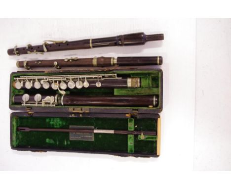 English Rudall, Carte & Co flute 65.5cm long, serial no. 4239, a crack on the mouthpiece section has been repaired (photograp