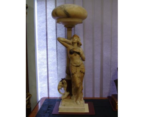 Good antique Art Nouveau marble & alabaster lamp in the form of an Egyptian woman standing below a spherical domes shade on a