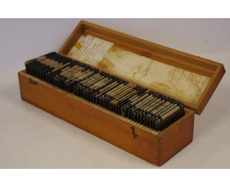 Vintage timber box of glass slides of various English towns