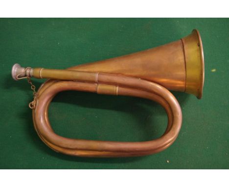 Vintage copper bugle with mouthpiece