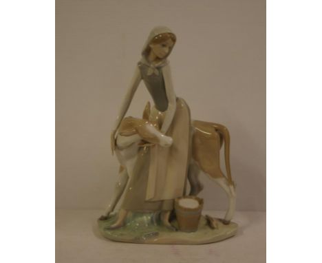 Large Lladro girl with cow figurine as inspected, 34cm high approx.