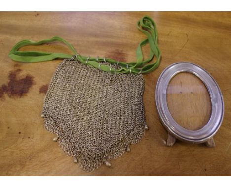 Sterling silver oval photo frame hallmarked Birmingham 1914 together with a vintage metal mesh purse