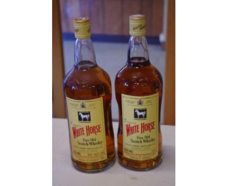 Two bottles of White Horse Scotch Whisky