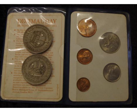 Two Australian 1937 silver Crowns together with a cased UK first decimal coins