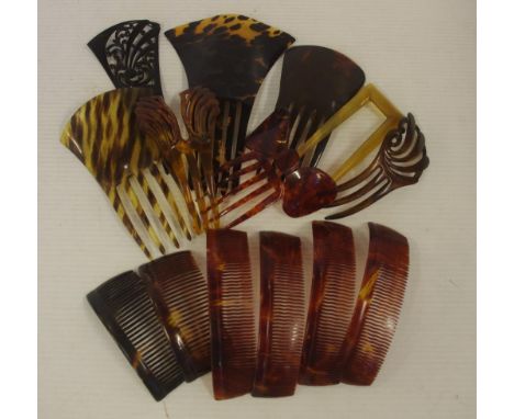 A collection of vintage hair combs to include tortoiseshell,