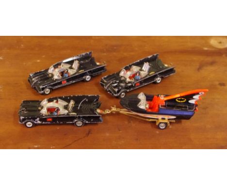 Three Corgi Toys Batmobiles and a Batboat with trailer