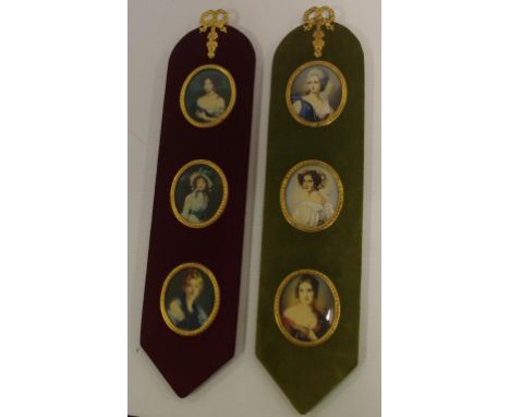 Two decorative portrait wall panels 34cm high