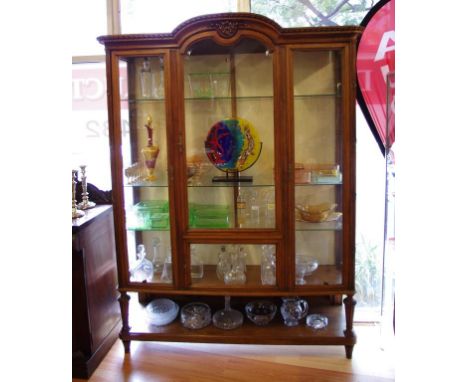 Antique European walnut display cabinet with carved centre dome top, glass shelves and a separate key lock door for the botto