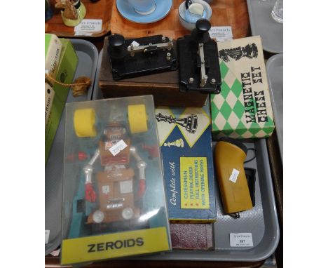 Collection of oddments to include: Zeroids Robot in perspex case, two Merit toy Morse Code toys, magnetic chess set and other