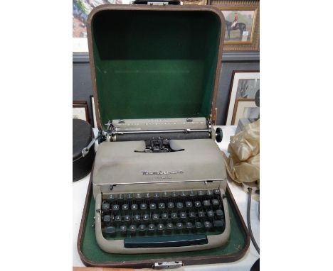 Cased Remington Quiet Riter typewriter. (B.P. 21% + VAT) 