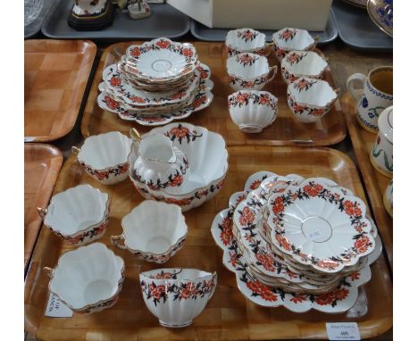 Two trays of 19th Century Wileman & Co floral design teaware to include: teacups and saucers, milk jug, sugar bowl, serving p