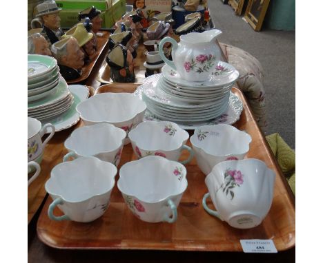 Tray of Shelley rose design moulded floral teaware to include: teacups and saucers, milk jug, sugar bowl, plates, square serv