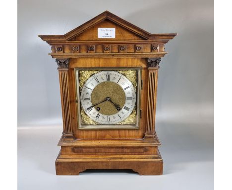 Early 20th century walnut architectural two train mantle clock, with silver chapter ring and Roman numerals, with key and pen