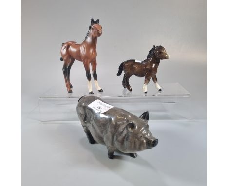 Beswick and Royal Doulton ceramic Foals together with a Royal Doulton Pig.   (B.P. 21% + VAT) 