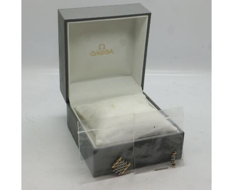 Omega wristwatch box with spare bi-metallic links. UK P&amp;P Group 1 (£16+VAT for the first lot and £2+VAT for subsequent lo