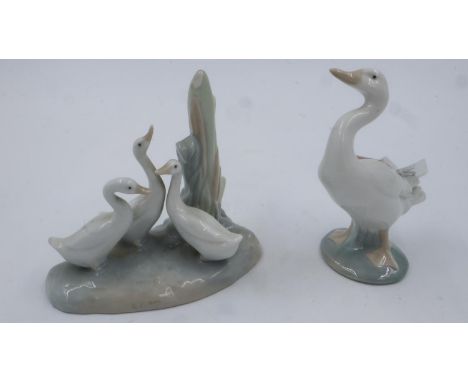 Lladro goose and a similar Nao figure group, largest H: 12 cm. chip to tree top. UK P&amp;P Group 2 (£20+VAT for the first lo