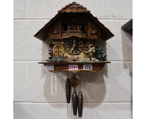 Swiss musical and autonomous Kathe Wohlfarth Black Forest clock, some trees are detached, H: 30 cm. Not available for in-hous