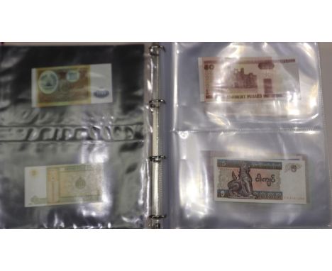 Folder of world banknotes, mostly uncirculated. UK P&amp;P Group 1 (£16+VAT for the first lot and £2+VAT for subsequent lots)