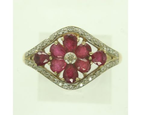 Modern 9ct gold ring set with rubies and diamonds, size T, 3.1g. UK P&amp;P Group 0 (£6+VAT for the first lot and £1+VAT for 