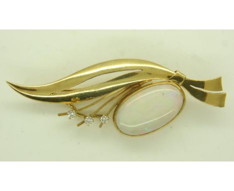 Continental gold brooch (unmarked), set with a large oval cabochon opal and three diamonds, L: 65 mm, 11.9g. P&amp;P Group 0 