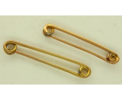 Two 9ct gold pin brooches, largest L: 40 mm, combined 3.7g. P&amp;P Group 0 (£6+VAT for the first lot and £1+VAT for subseque