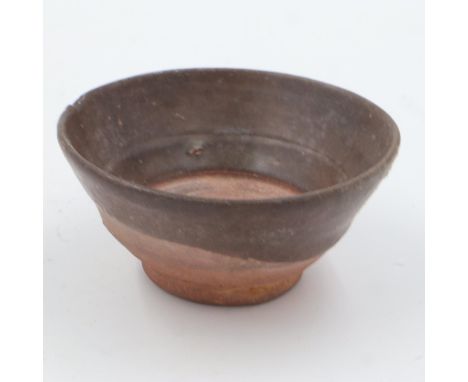 Southern Song Dynasty partially glazed footed bowl, chip to rim beneath glaze, D: 10 cm. UK P&amp;P Group 1 (£16+VAT for the 