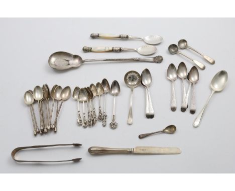 A MIXED LOT:- A set of six George III bright-cut tea spoons by George Gray, London 1793, a pair of George III sugar tongs, mo