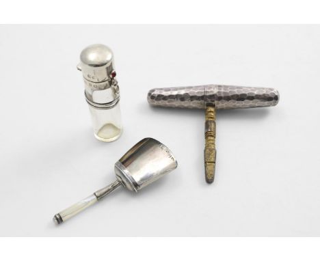 A LATE VICTORIAN PORTABLE CARRIAGE KEY double-tapering with a hammered finish and a fold-out, gilt steel key, maker's mark ov