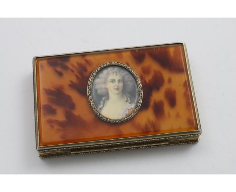 A MID 20TH CENTURY ITALIAN SILVERGILT RECTANGULAR COMPACT with a faux tortoiseshell cover inset with the miniature portrait o