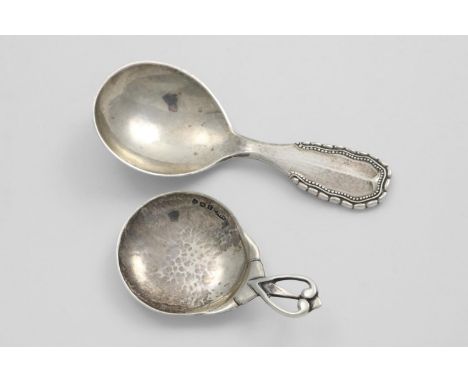 BY GEORG JENSEN:- A pre-war Danish Viking pattern caddy spoon with English import marks for London 1931 and a handmade caddy 