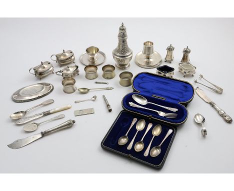 A MIXED LOT:- A cased spoon &amp; fork, a cased set of five tea spoons, a vesta holder/striker, sundry small flatware, condim