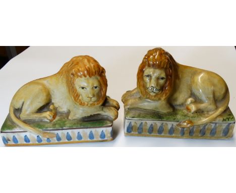 PR OF CERAMIC RECUMBANT LIONS