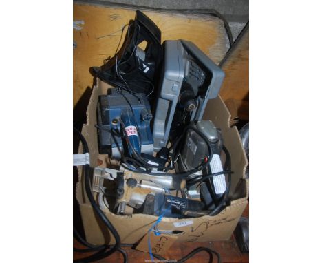 A quantity of power tools, sander, router, cordless drill, and a large wood planer.