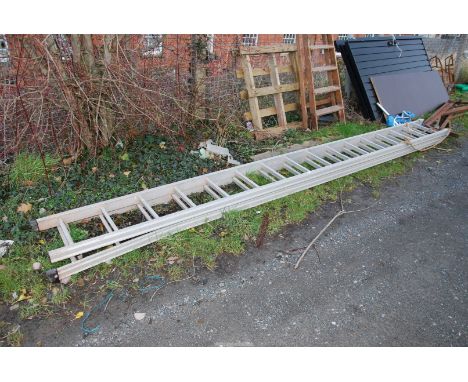 An Aluminum 16 rung extension  ladder.