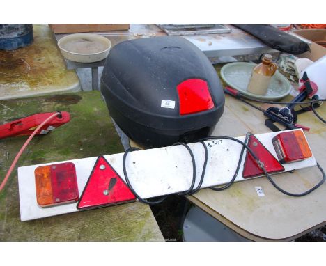 A Trailer Light Board and a Motorcycle Carrier Box (no key).