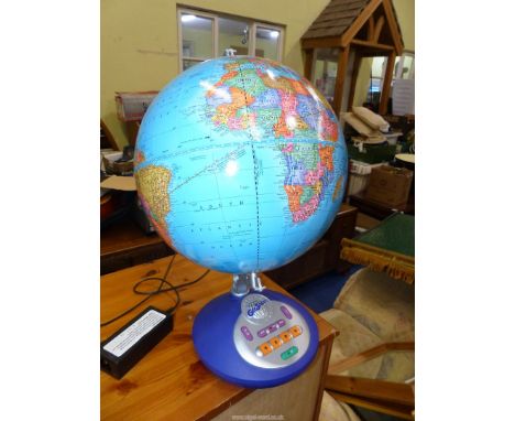 A boxed GeoSafari Talking Globe electronic quiz game.