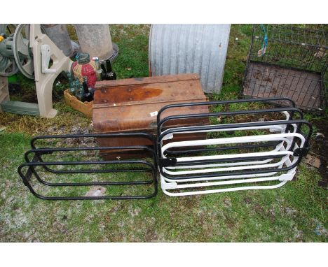 Wall mounted Racks and a Tin Trunk.