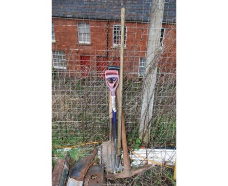 Two forks and a spade, long handled fork and pick axe.