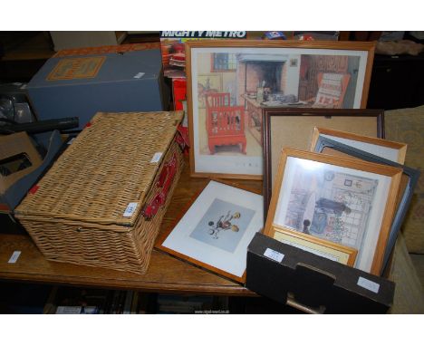 A wicker picnic hamper with contents, plus prints.